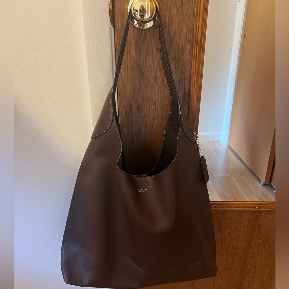 Gently used coach Brooklyn 39 Hobo Bag in Maple Natural Grained Leather.